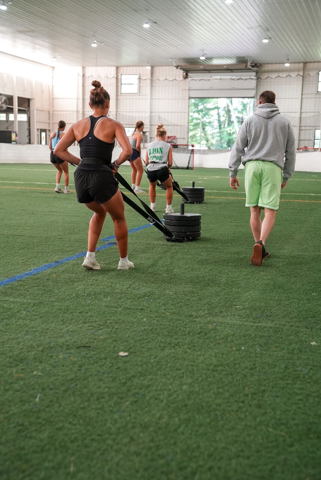 Athletes training on the turf