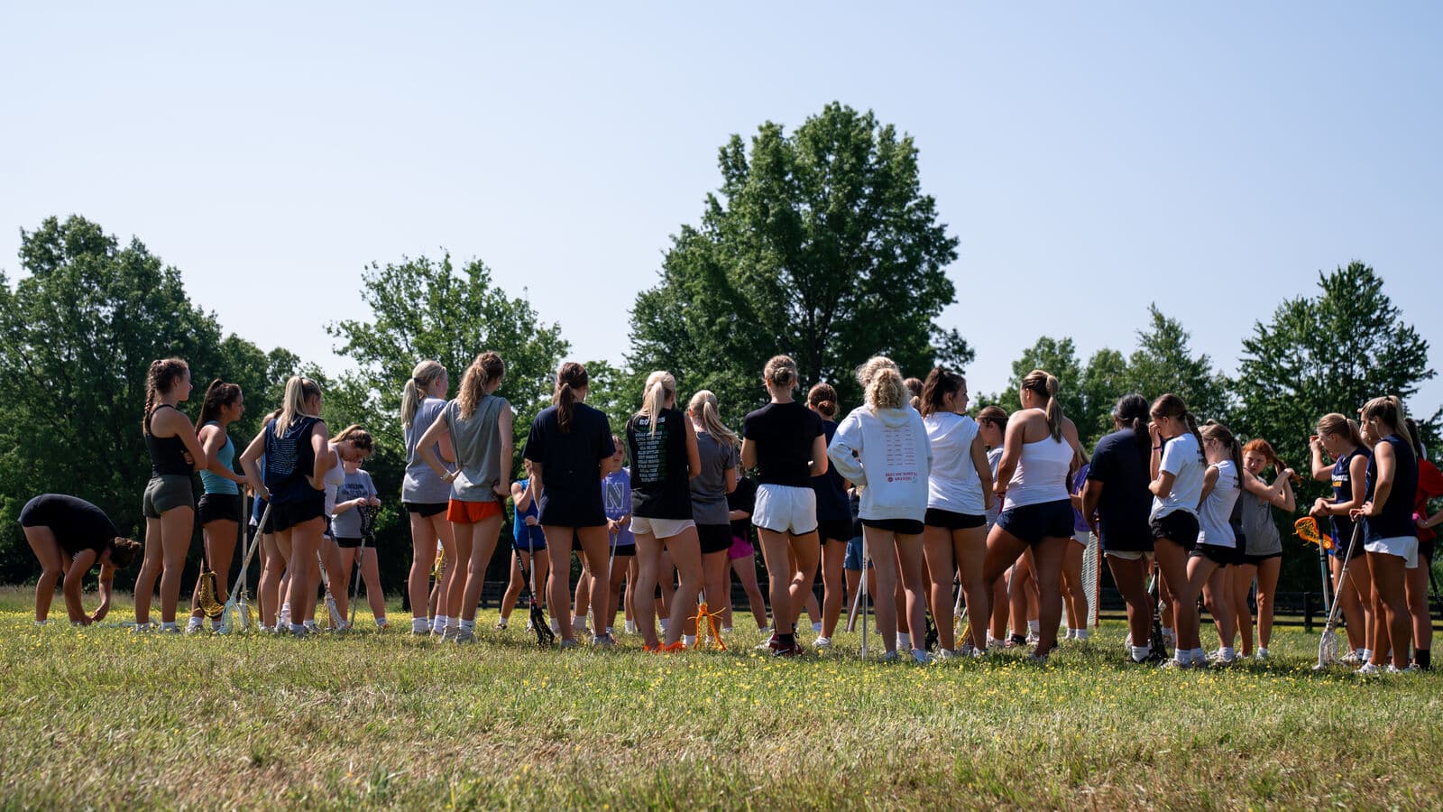 Summer lacrosse training on the field